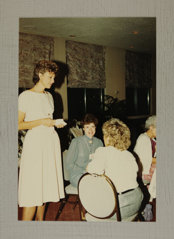 Wadsworth, Ryan, and Unidentified Talking at Convention Photograph, July 6-10, 1986 (Image)