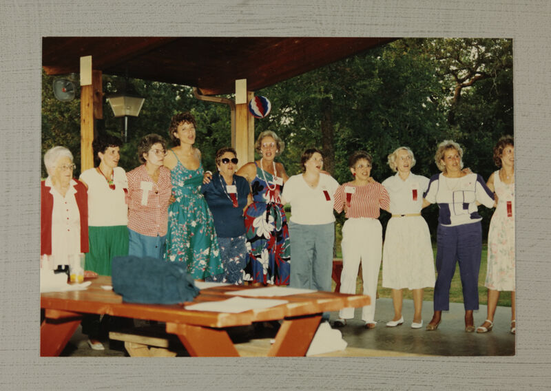 Phi Mus in Picnic Shelter at Convention Photograph 1, July 6-10, 1986 (Image)