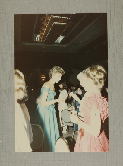 Pam Wadsworth Lighting Candle at Convention Banquet Photograph 1, July 6-10, 1986 (image)