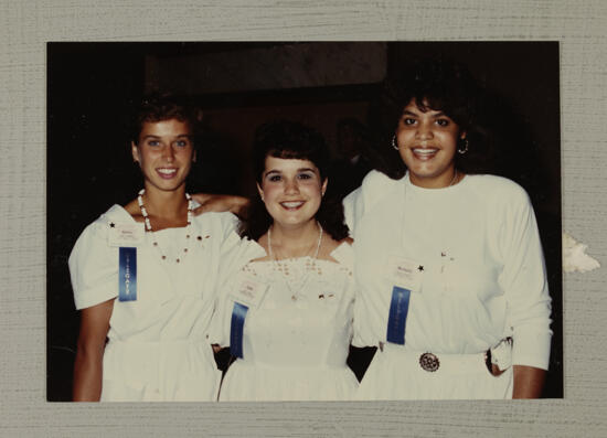 Group of Three in White Dresses at Convention Photograph, July 6-10, 1986 (image)