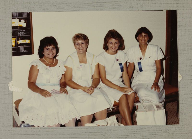 Group of Four in White Dresses at Convention Photograph, July 6-10, 1986 (Image)
