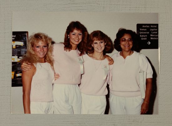 Four Convention Attendees Photograph, July 6-10, 1986 (image)