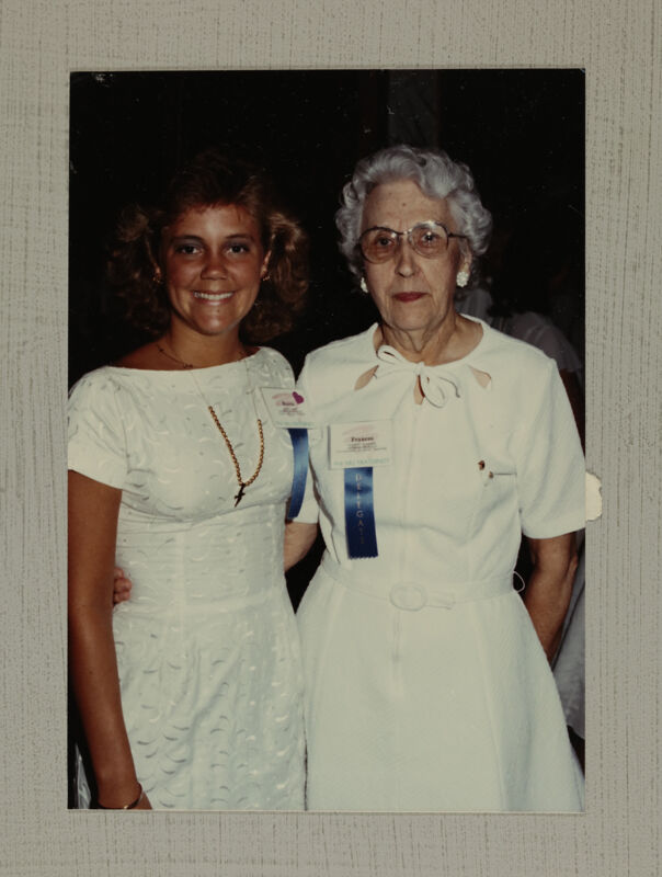 Unidentified and Frances McAdams in White Dresses at Convention Photograph, July 6-10, 1986 (Image)