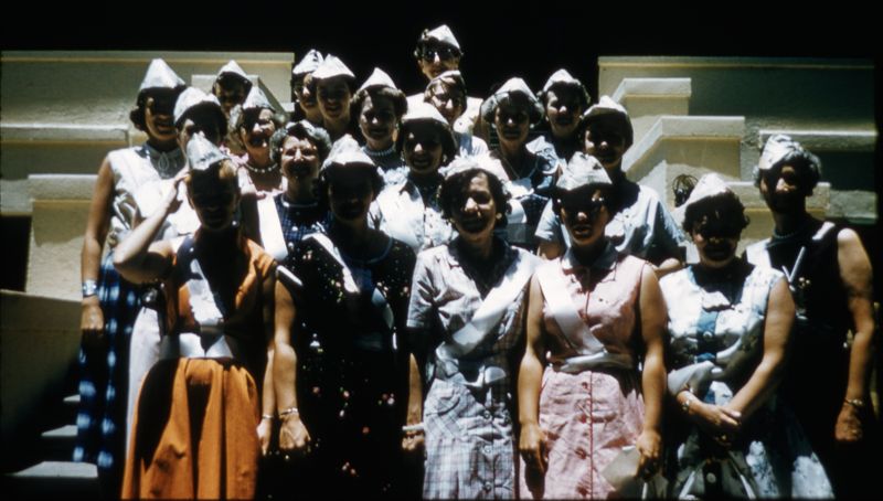 District Convention Group Wearing Hats and Sashes Slide Image