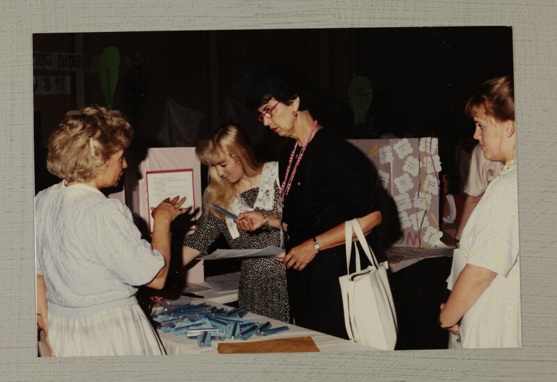 Phi Mus Talking by Convention Exhibits Photograph, July 1-5, 1988 (Image)