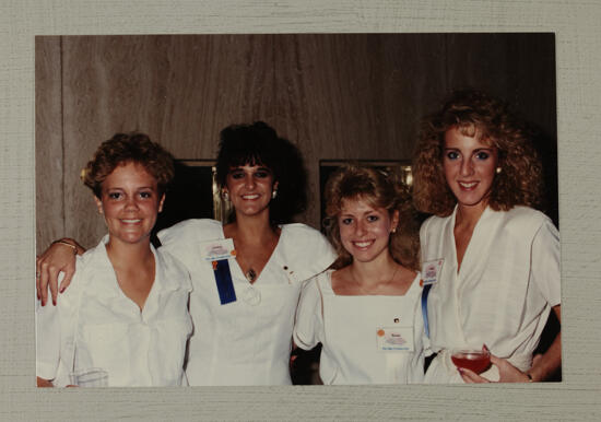 Group of Four in White Dresses at Convention Photograph, July 1-5, 1988 (image)