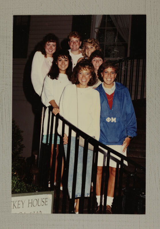 Group of Seven on Staircase at Convention Photograph, July 1-5, 1988 (Image)