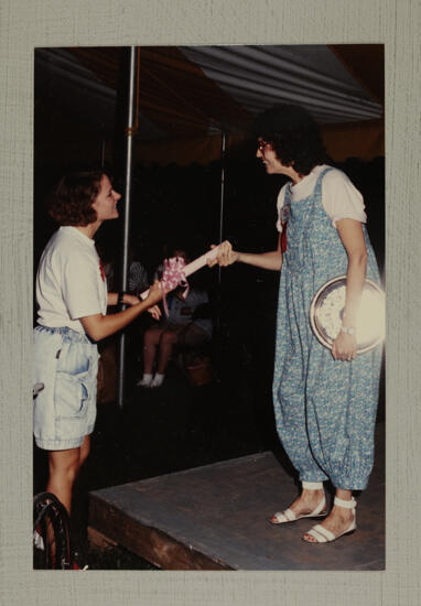 Unidentified Phi Mu Receiving Award at Convention Photograph, July 1-5, 1988 (image)