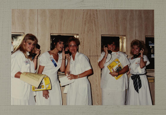 Five Phi Mus Make Telephone Calls During Convention Photograph, July 1-5, 1988 (image)