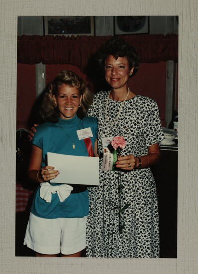 Pam Wadsworth and Unidentified With Certificate at Convention Photograph, July 1-5, 1988 (image)