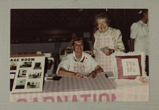 Phoenix Alumna and Adele Kirkpatrick in Convention Carnation Shop Photograph, July 6-9, 1990 (image)