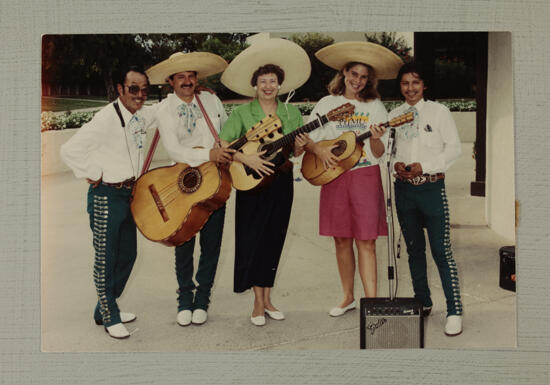 Two Phi Mus in Sombreros with Musicians Photograph, July 6-9, 1990 (image)