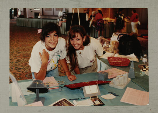 Two Phi Mus Looking a Jewelry Display at Convention Photograph, July 6-9, 1990 (image)