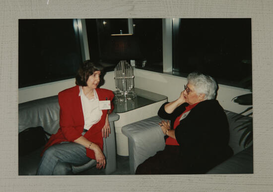 Two Unidentified Phi Mus Talking at Convention Photograph, July 1-4, 1994 (image)