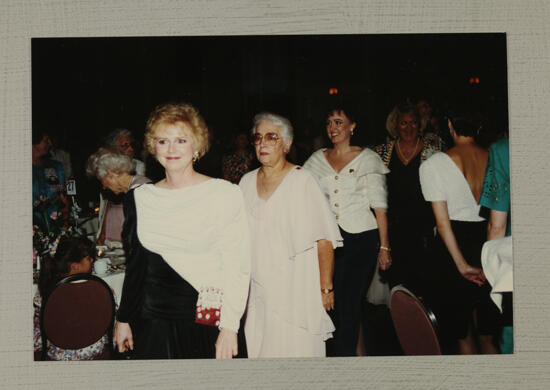 Lewis, Reed, and Schmidt Enter Convention Banquet Photograph, July 1-4, 1994 (image)