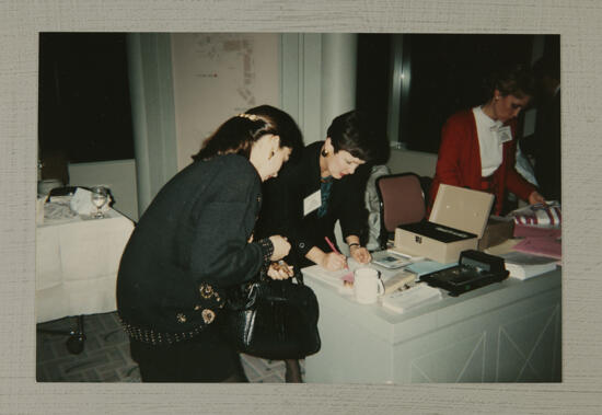 Phi Mus at Convention Administrative Desk Photograph 1, July 1-4, 1994 (image)