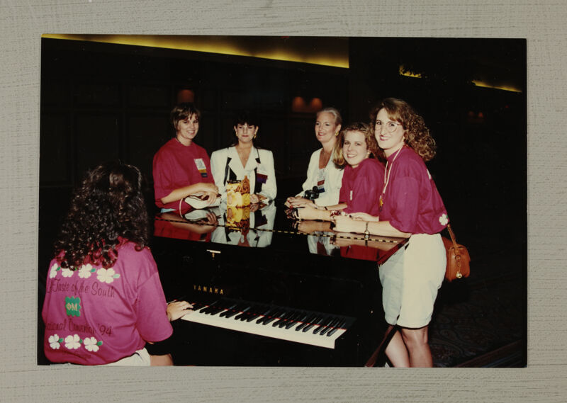 July 1-4 Group of Six Around Piano at Convention Photograph Image