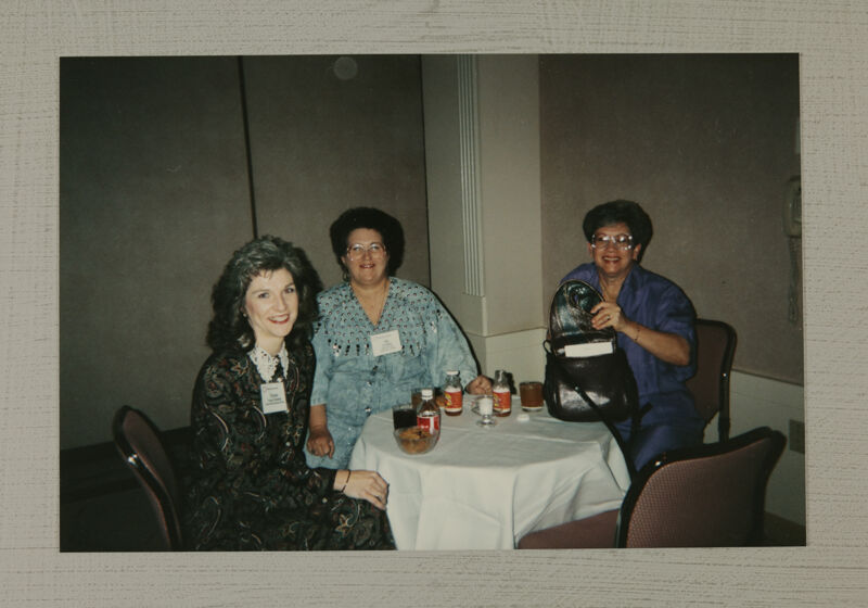 Three Phi Mus Enjoy Refreshments at Convention Photograph, July 1-4, 1994 (Image)
