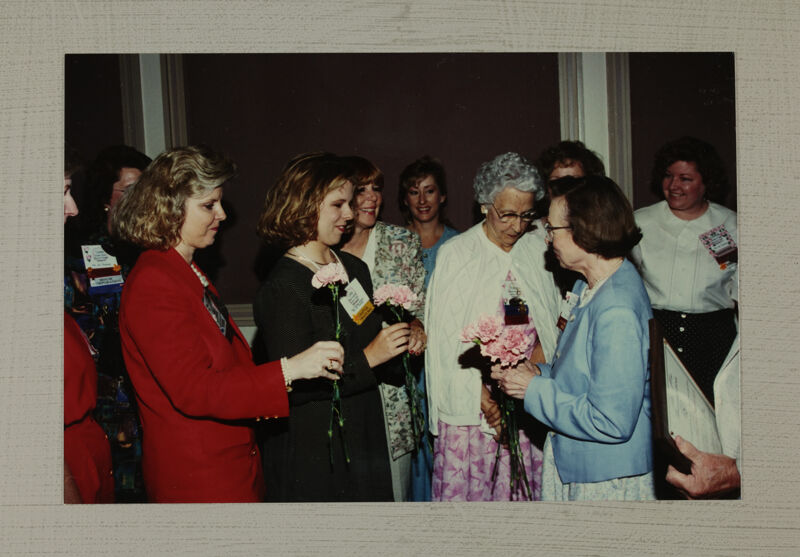 Phi Mus Presenting Carnations to Betty Wilkenson at Convention Photograph, July 1-4, 1994 (Image)