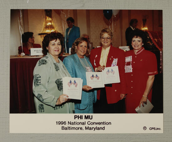 Johnson, Wood, Williams, and Garland With Certificates at Convention Photograph, July 4-8, 1996 (image)