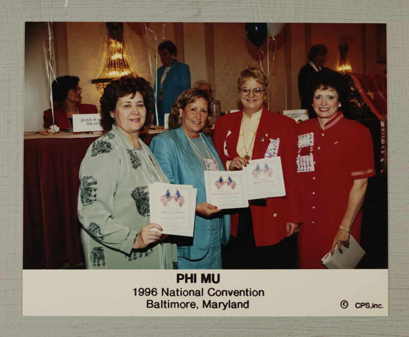 Johnson, Wood, Williams, and Garland With Certificates at Convention Photograph, July 4-8, 1996 (Image)