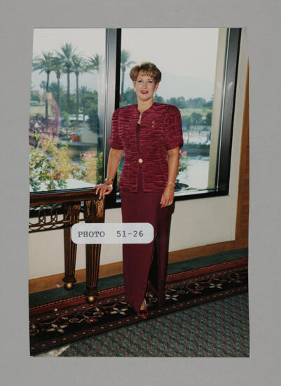 Unidentified Phi Mu in Red Dress at Convention Photograph, July 3-5, 1998 (image)