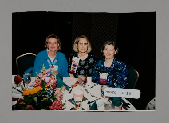 Moore, Stallard, and Unidentified at Banquet Table Photograph, July 3-5, 1998 (image)