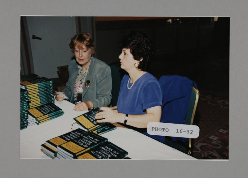 Ann Marie Sabath Signing Books at Convention Photograph 1, July 3-5, 1998 (Image)