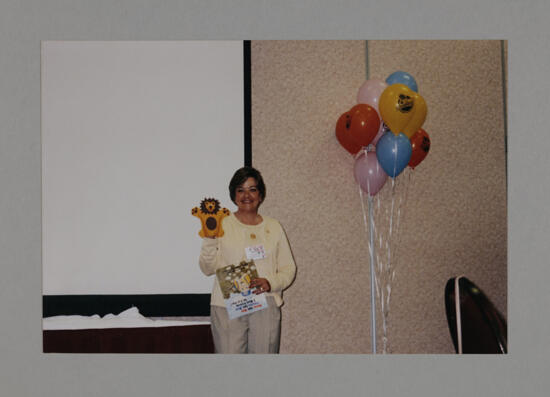 Penny Cupp and a Puppet at Convention Philanthropy Party Photograph, July 3-5, 1998 (image)