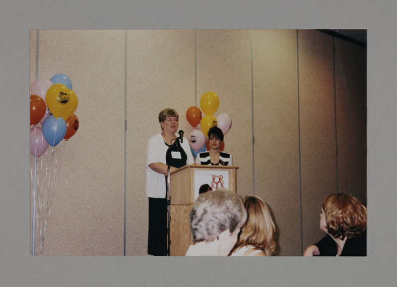 Renee Peterson Speaking at Convention Philanthropy Party Photograph, July 3-5, 1998 (Image)