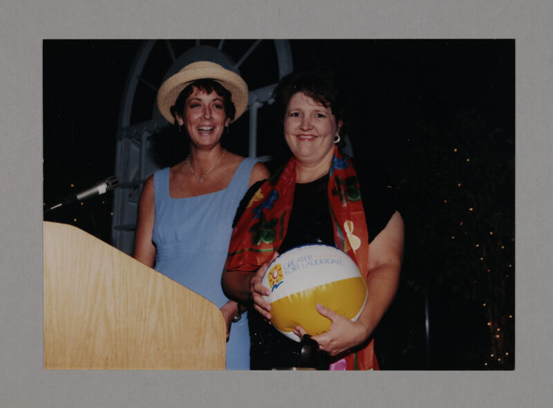 Jen Wesley and Karen Belanger Inviting Phi Mus to Next Convention Photograph 1, July 3-5, 1998 (Image)