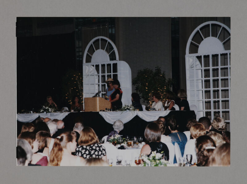 Jen Wesley and Karen Belanger Inviting Phi Mus to Next Convention Photograph 2, July 3-5, 1998 (Image)