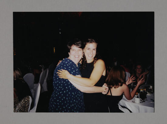 Teresa Carroll and Unidentified Hugging at Convention Photograph, July 3-5, 1998 (image)