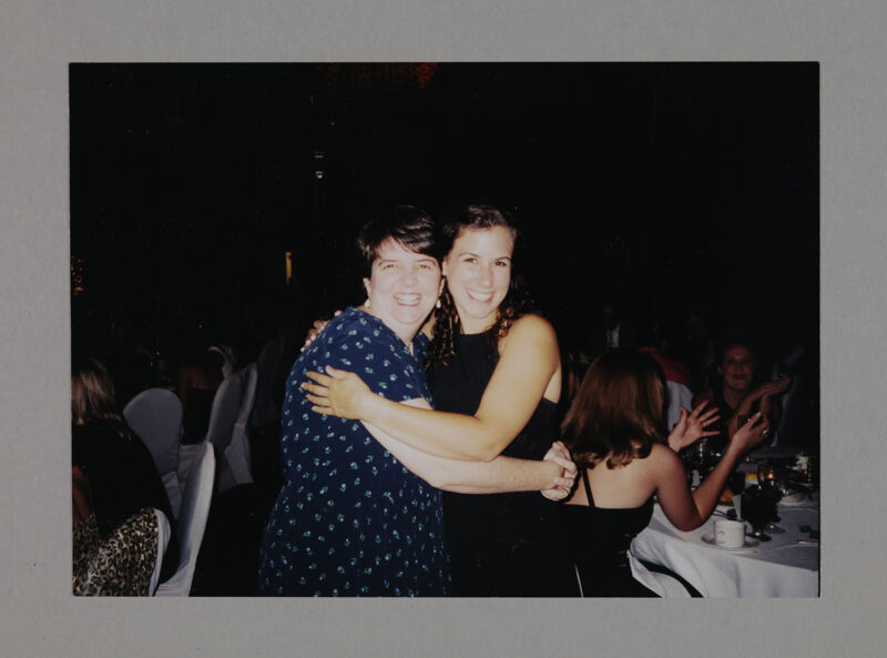 Teresa Carroll and Unidentified Hugging at Convention Photograph, July 3-5, 1998 (Image)