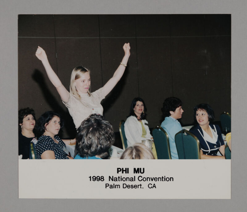 Phi Mu Gestures in Convention Session Photograph 1, July 3-5, 1998 (Image)