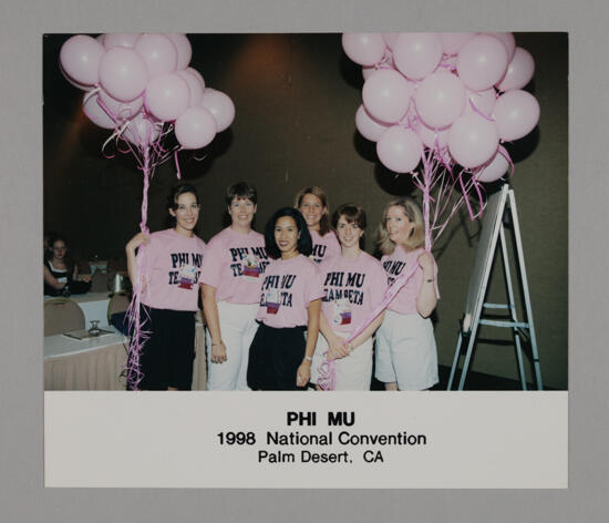 Team Beta with Pink Balloons at Convention Photograph 2, July 3-5, 1998 (image)