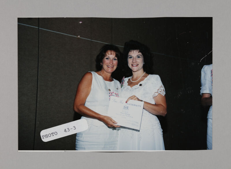Mary Young and Frances Mitchelson with Certificate at Convention Photograph, July 3-5, 1998 (Image)