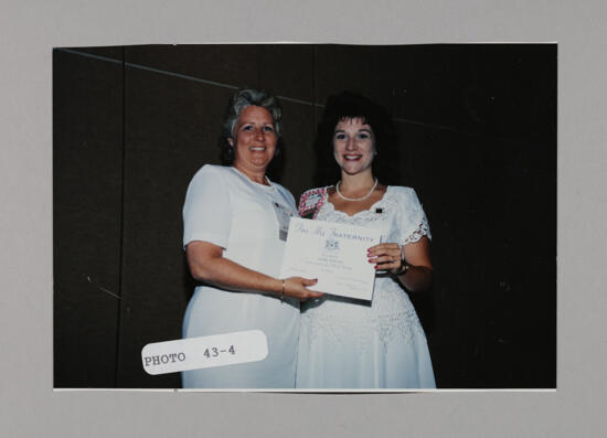 Sally Faison and Frances Mitchelson with Certificate at Convention Photograph, July 3-5, 1998 (image)