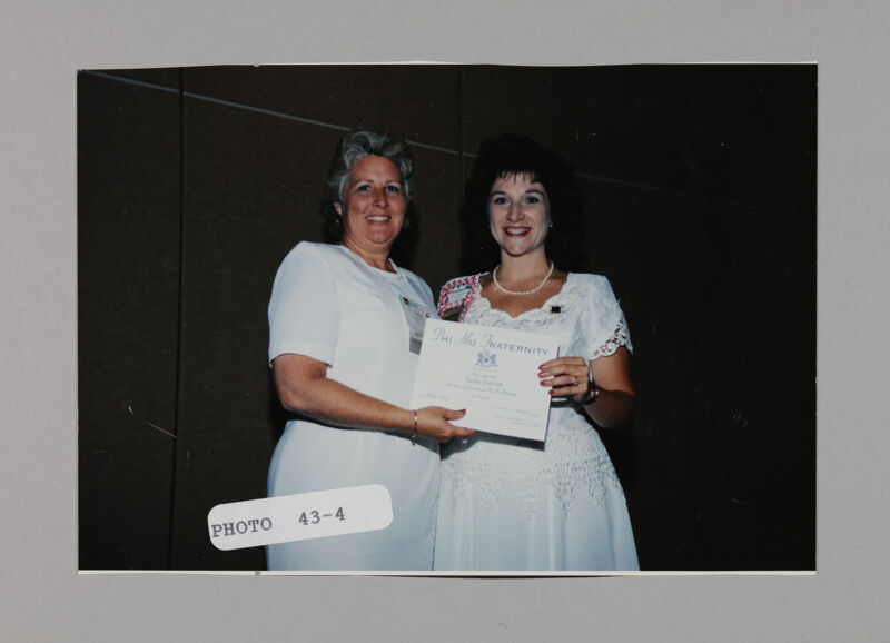 July 3-5 Sally Faison and Frances Mitchelson with Certificate at Convention Photograph Image