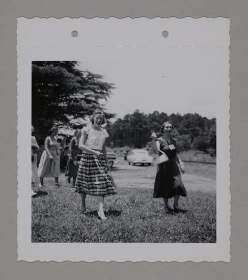 Kadie Gilchrist and Others Walking on Grass at Convention Photograph, June 23-28, 1952 (image)