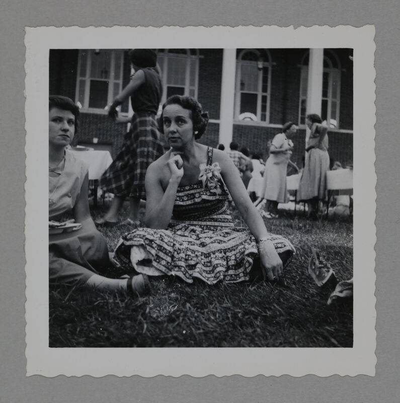 Polly Freear and Unidentified Sitting on Grass During Convention Photograph, June 23-28, 1952 (Image)