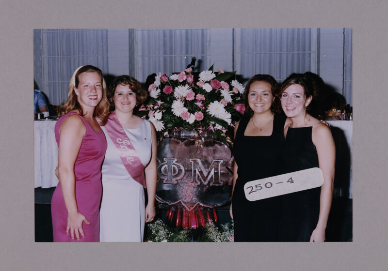 Molly Williams and Three Phi Mus by Convention Ice Sculpture Photograph, July 7-10, 2000 (Image)