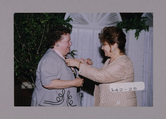 Anne Walker Receiving Outstanding Alumnae Achievement Award at Convention Photograph, July 7-10, 2000 (image)