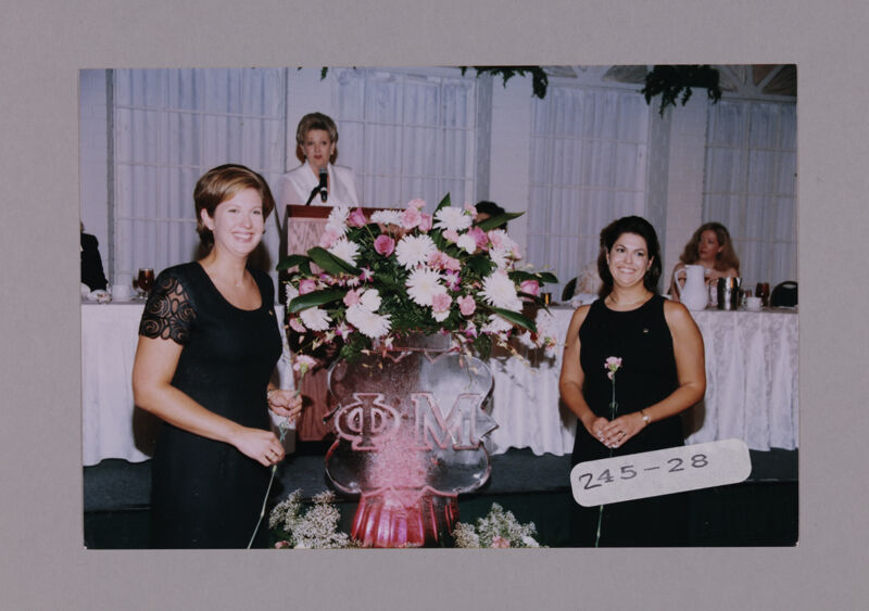 Mother and Daughter by Convention Ice Sculpture Photograph 1, July 7-10, 2000 (Image)