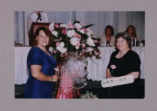 Mother and Daughter by Convention Ice Sculpture Photograph 2, July 7-10, 2000 (image)