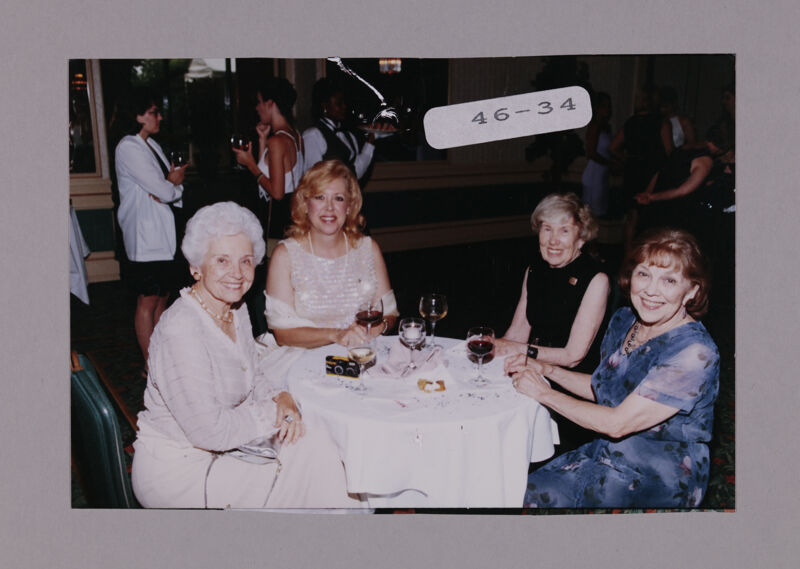 Campbell, Unidentified, Peterson, and Henson at Convention Reception Photograph, July 7-10, 2000 (Image)
