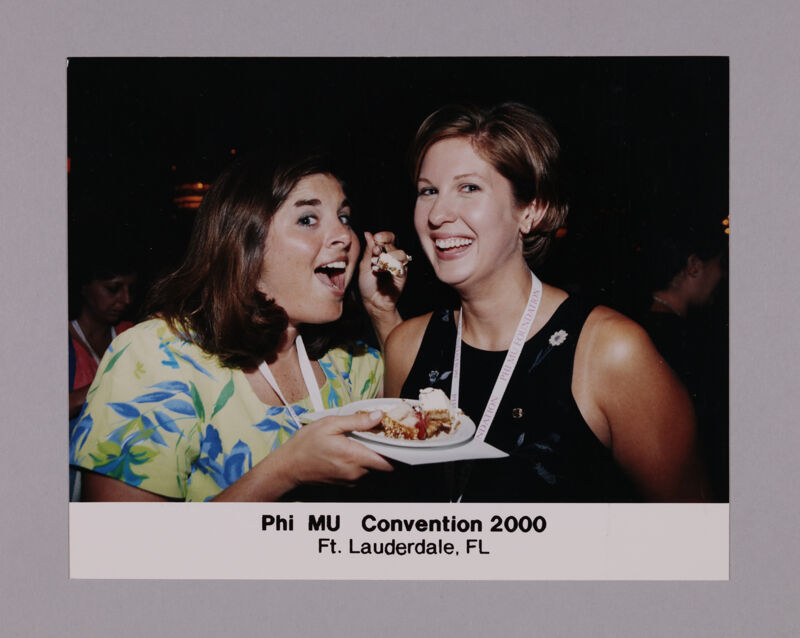 Two Phi Mus Eating Cake at Convention Photograph, July 7-10, 2000 (Image)