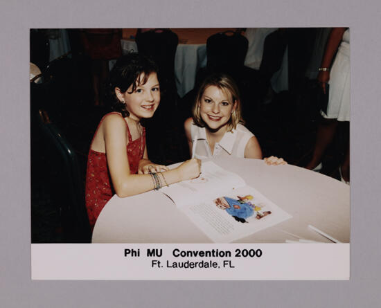 Unidentified Phi Mu and Child at Convention Photograph, July 7-10, 2000 (image)