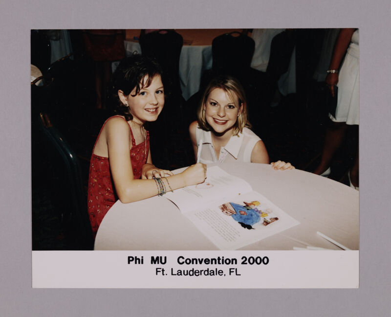Unidentified Phi Mu and Child at Convention Photograph, July 7-10, 2000 (Image)