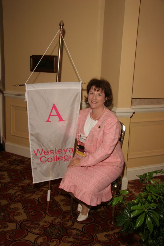 Frances Mitchelson With Alpha Chapter Flag at Convention Photograph 2, July 2006 (Image)
